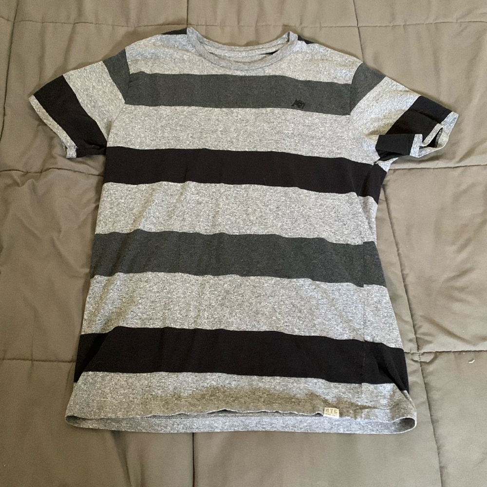 worn grey and black striped shirt